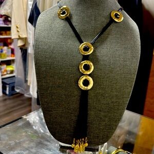 Long Necklace and bracelet set made with small leather strings